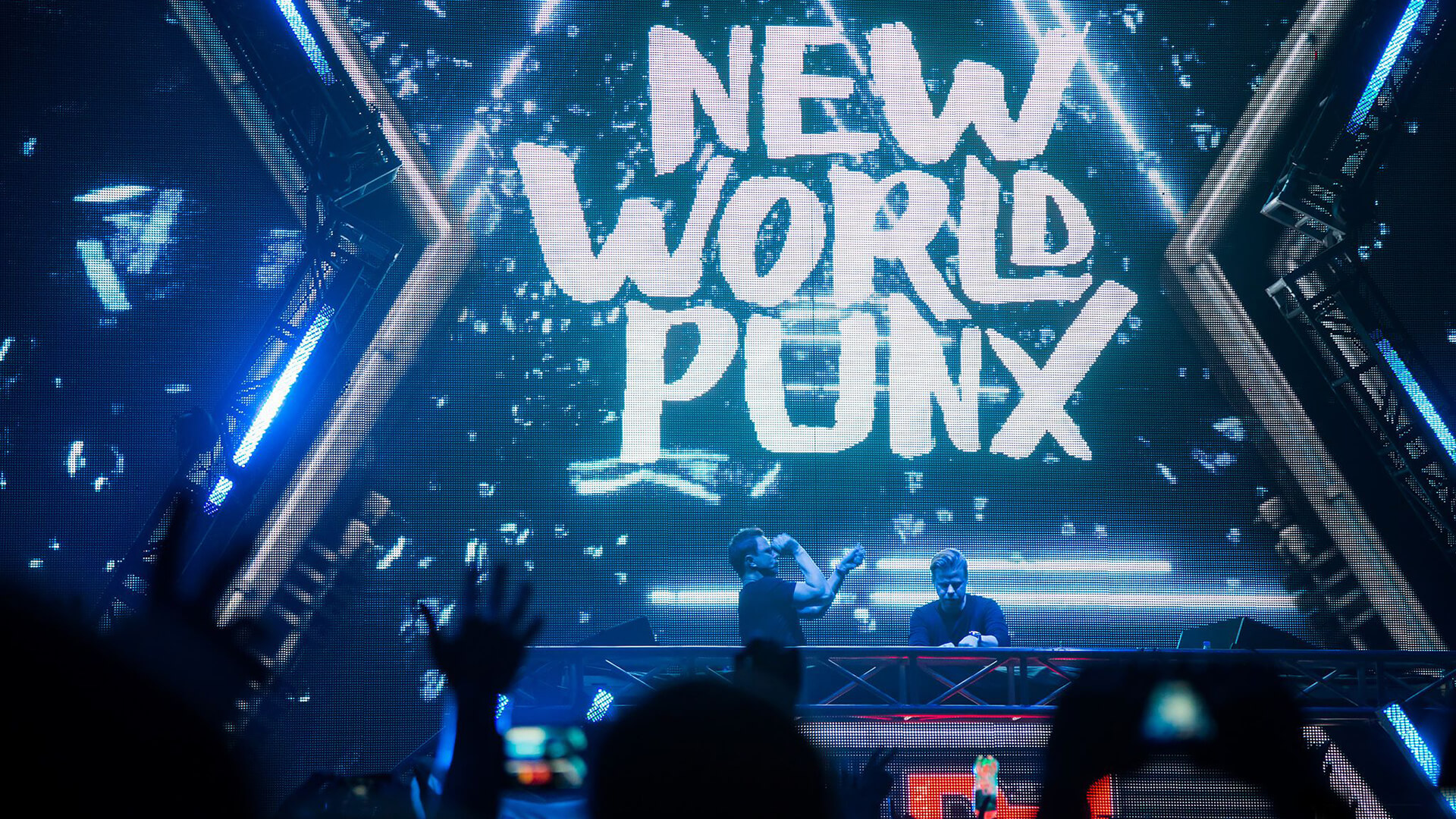 New World Punx logo on screen during concert